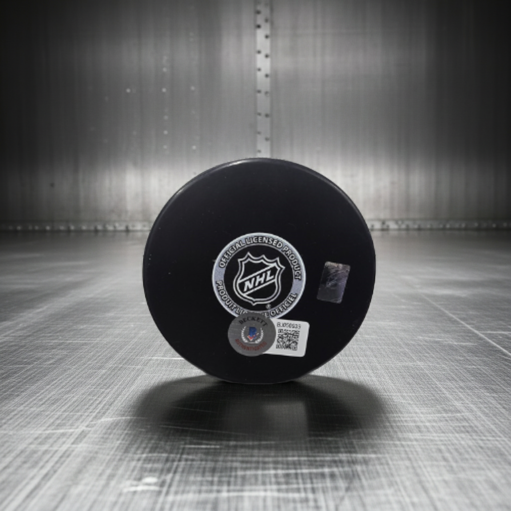 Travis Zajak New Jersey Devils Autographed Hockey Puck Beckett Hologram