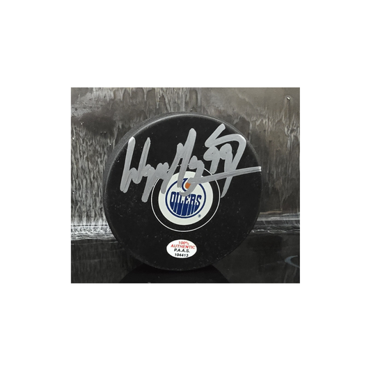 Wayne Gretzky of the Edmonton Oilers autographed logo hockey puck COA