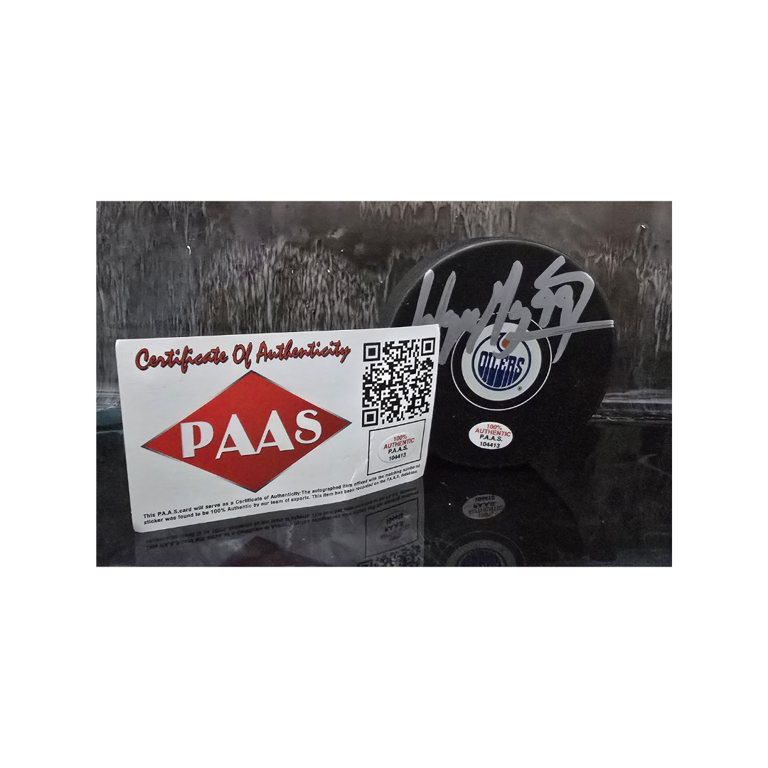 Wayne Gretzky of the Edmonton Oilers autographed logo hockey puck COA