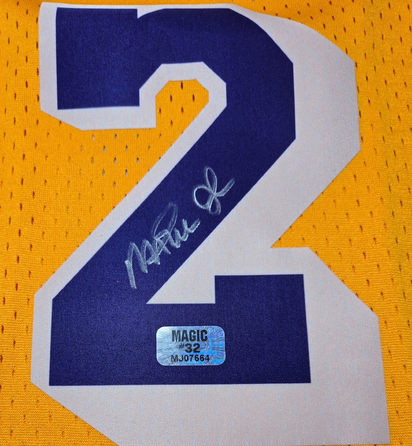 Magic Johnson of the LA Lakers autographed basketball jersey Player Hologram