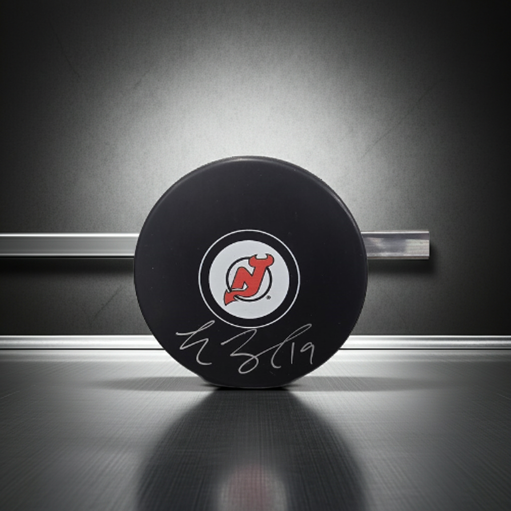 Travis Zajac New Jersey Devils autographed hockey puck with Beckett hologram