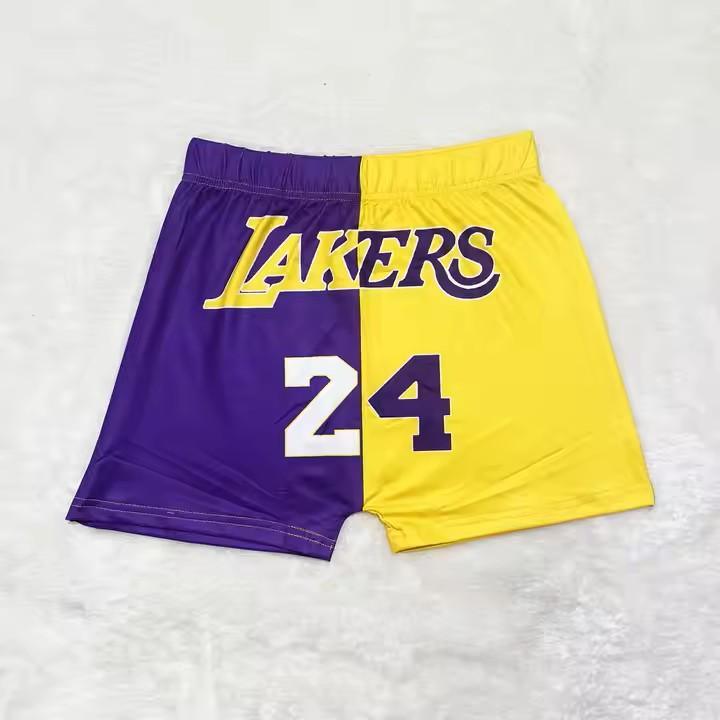 Purple and yellow Lakers basketball shorts with number 24 on front