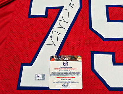 Close-up of Vince Wilfork signature on red number 75 jersey with Global Authentics COA and matching hologram GV980309