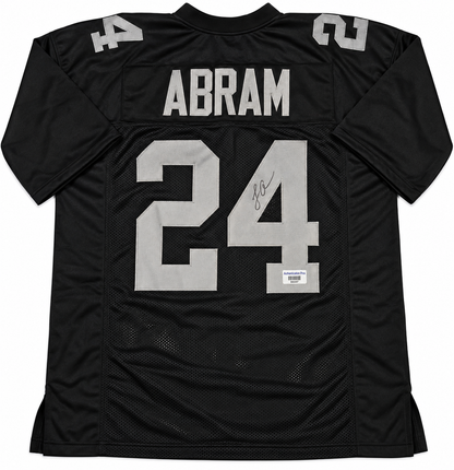 Back of Johnathan Abram signed black Raiders-style number 24 football jersey with autograph on number 4 and authentication sticker