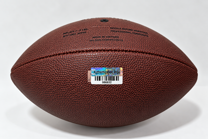 Authentication Pros hologram 986832 on Ezekiel Elliott signed football with authentication statement card