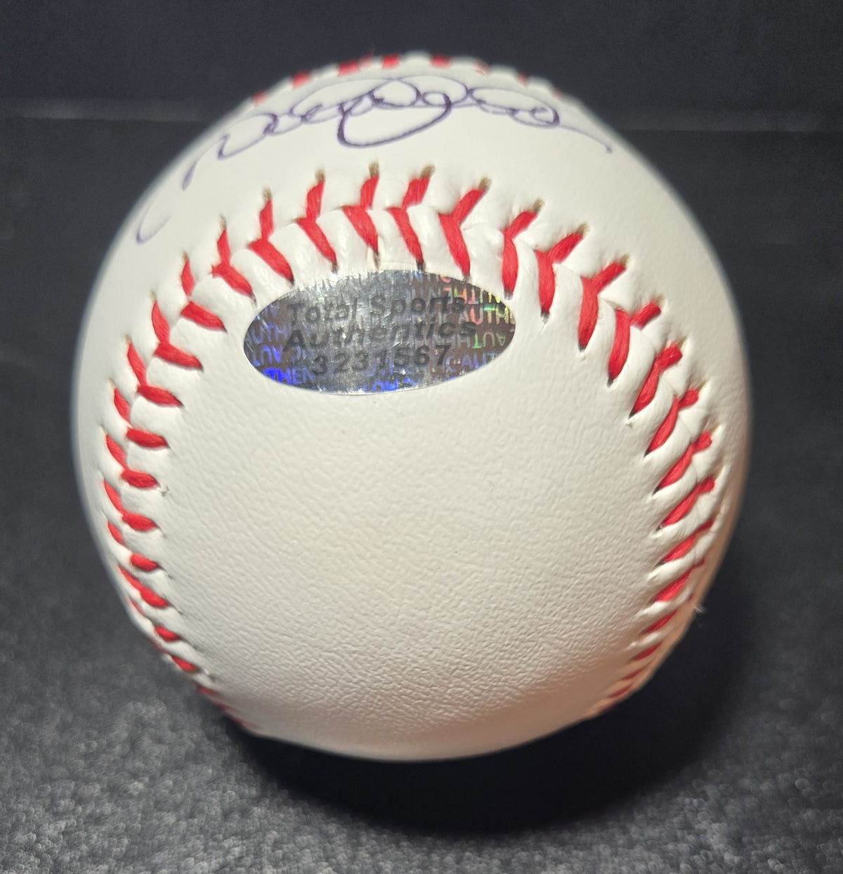 Additional view of Derek Jeter signed baseball with red stitching and autograph