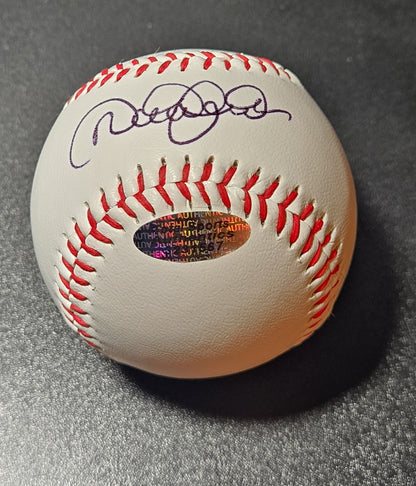 Derek Jeter autographed baseball showing blue-purple ink signature and oval Total Sports authentication hologram