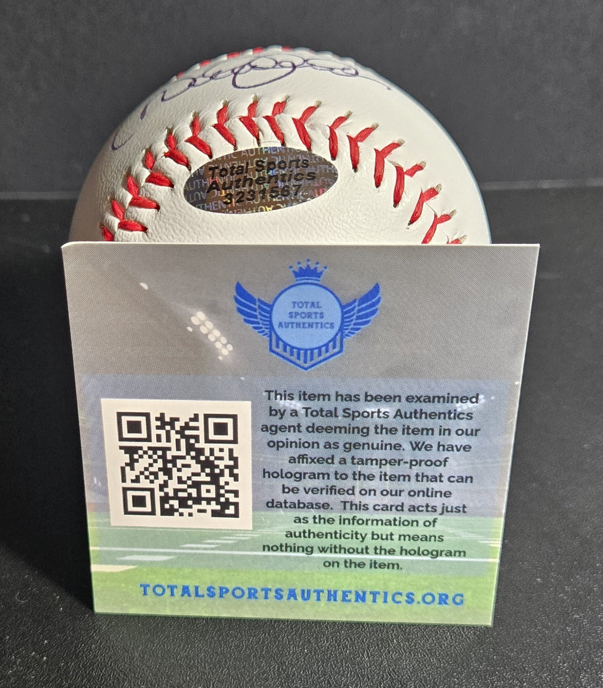 Close-up view of Derek Jeter signed baseball and Total Sports holographic authentication sticker