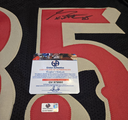 Authentication documentation photographed for George Kittle autographed black number 85 football jersey