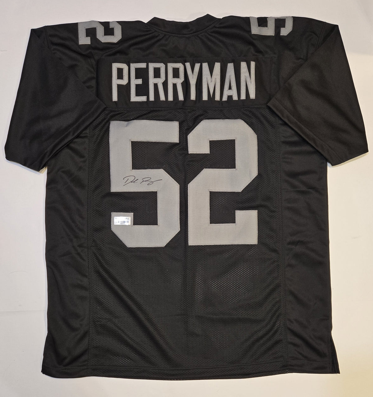 Back of Denzel Perryman autographed black Las Vegas Raiders-style number 52 jersey with signature on number 5, item associated with Authentication Pros 986443