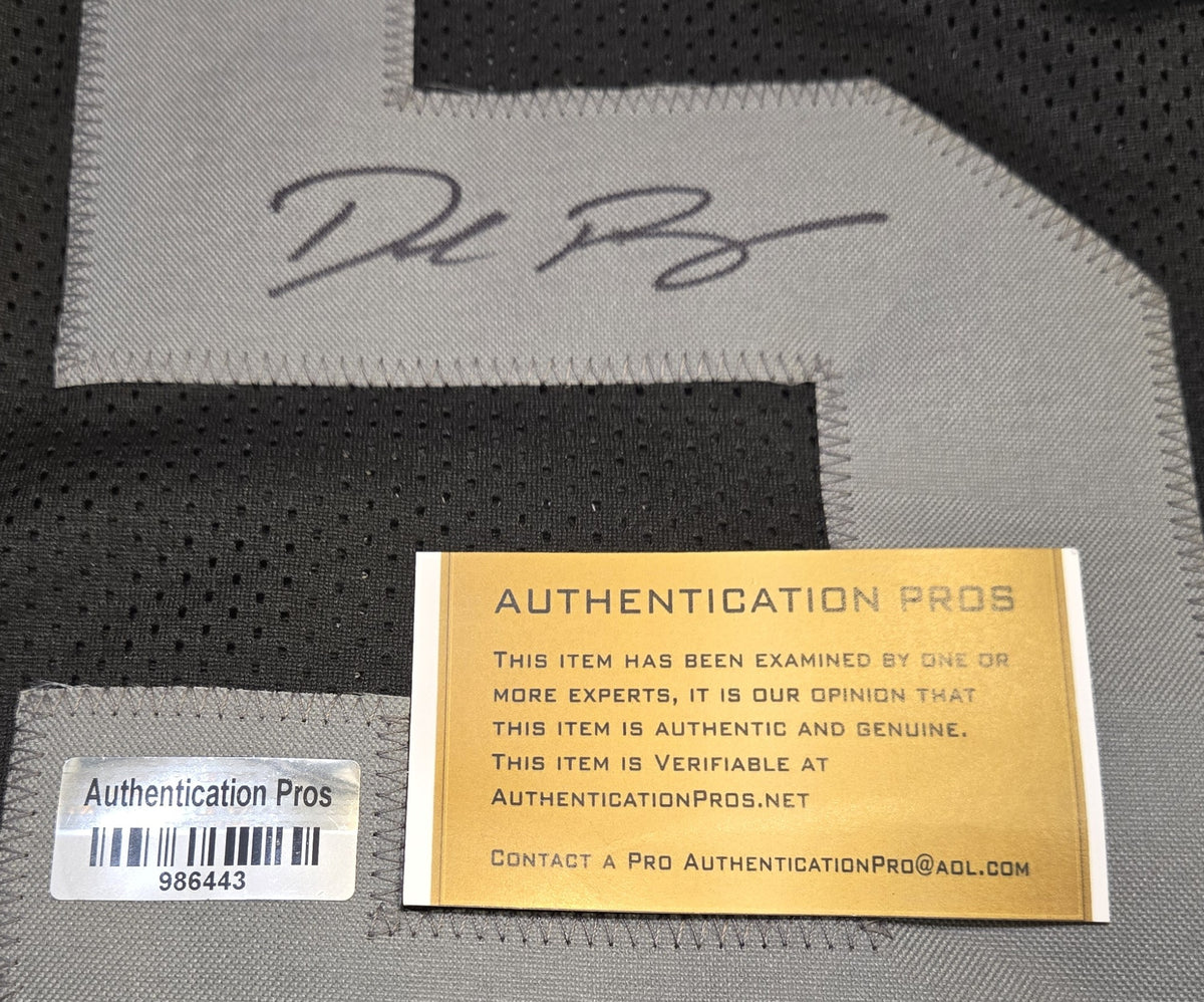 Authentication Pros certificate and authentication details photographed for Denzel Perryman signed Raiders number 52 jersey, recorded number 986443