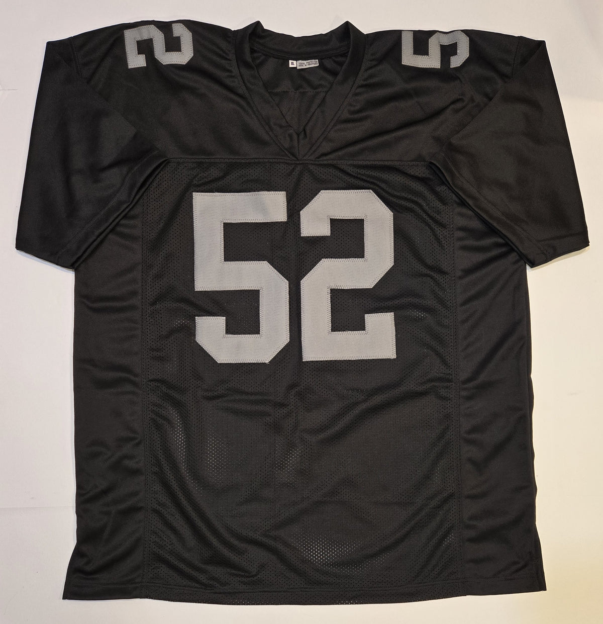 Front of Denzel Perryman black Las Vegas Raiders-style football jersey with silver-gray number 52, size XL