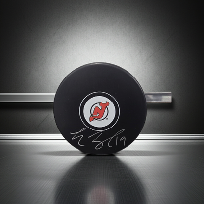 Travis Zajac New Jersey Devils autographed hockey puck with Beckett hologram