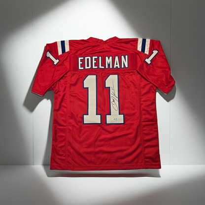 Julian Edelman New England Patriots autographed red football jersey with COA, primary product image